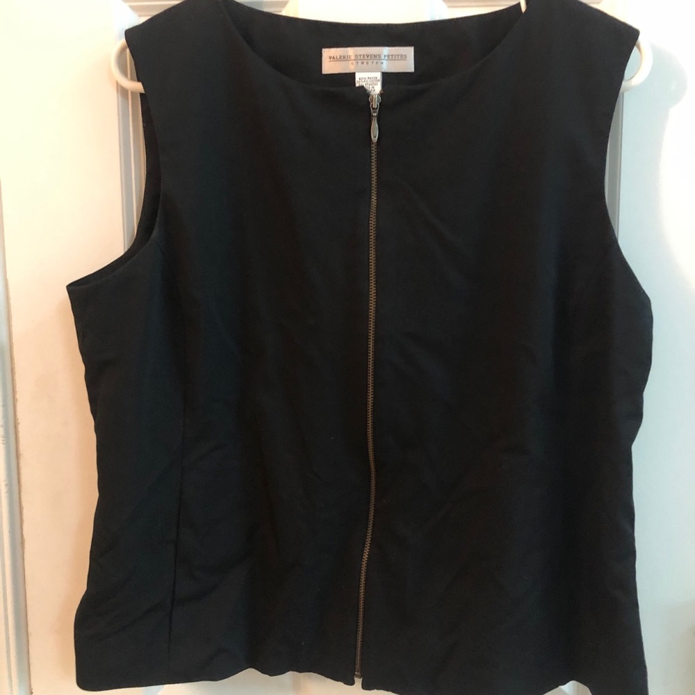 Women’s black zippered top.